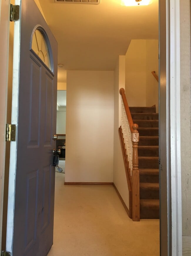 From the entry door, looking into the main hallway. - 1119 Maple St