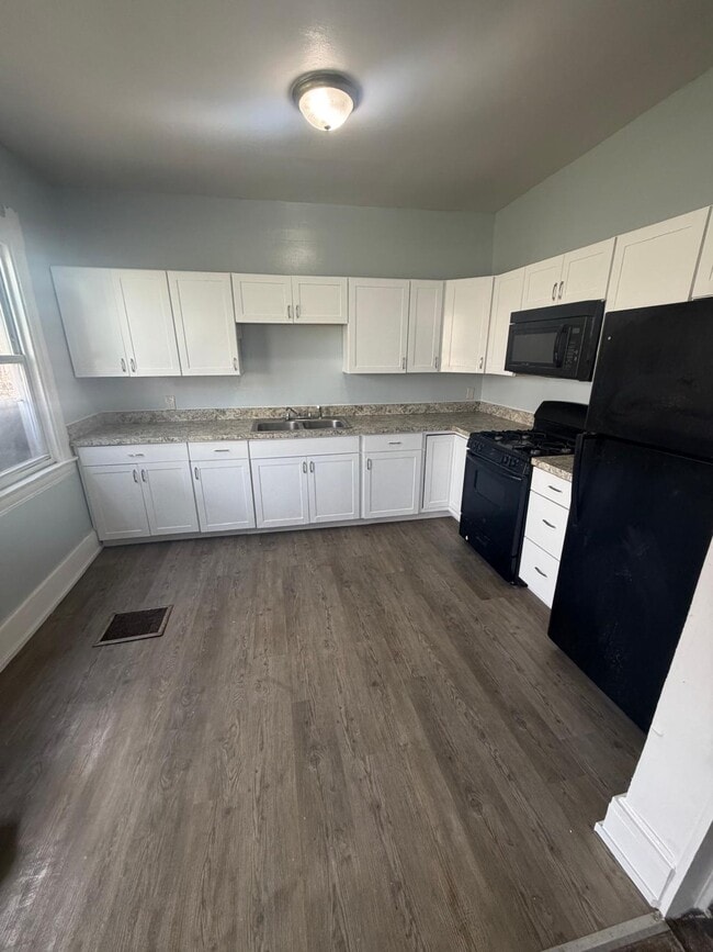 Building Photo - 1509 N Salina St Unit 1