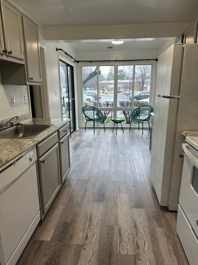 Building Photo - 8131 Needwood Rd Unit T101