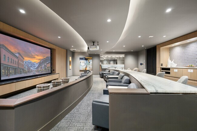 Media room with HD projector and cinema-style seating
