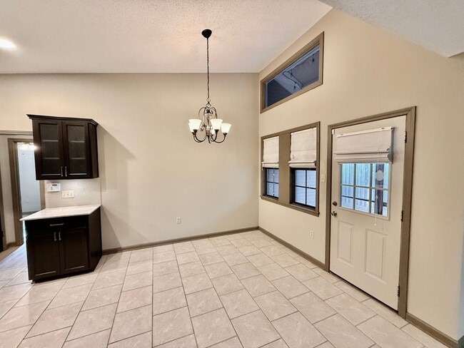 Photo - Spacious 3BR/2BA Home in Terre Haute – Fireplace, Garage, Fenced Yard + Lawn Care Included