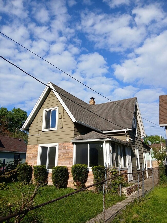 Photo - Newly Renovated 4BR/1BA Single-Family Home with Garage – Cleveland