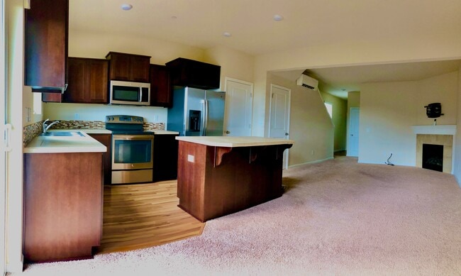 Living Room + Fireplace - 15766 SE Nyla Way Townhome