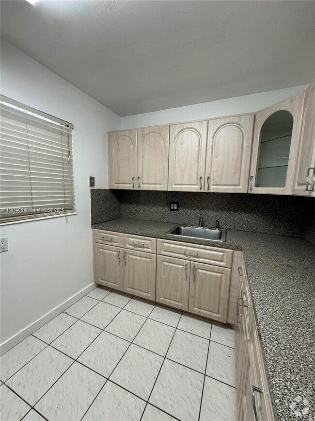 Building Photo - 7787 SW 86th St Unit E-106 Rental