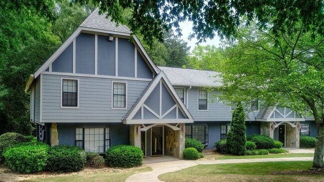 A welcoming community surrounded by greenery and lakeside views