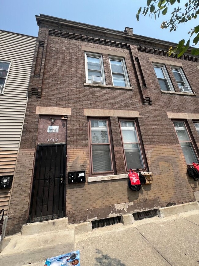 Building Photo - 3542 W 24th St Unit APT 1