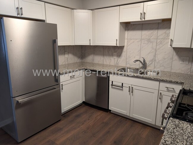 Photo - Remodeled house with garage