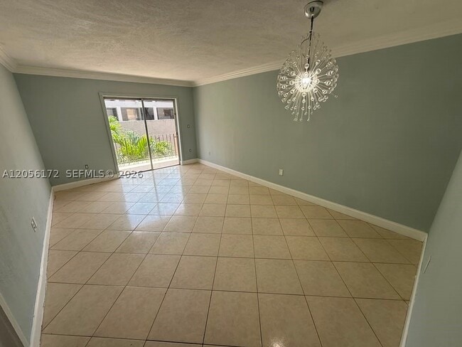 Building Photo - 1055 W 77th St Unit 309