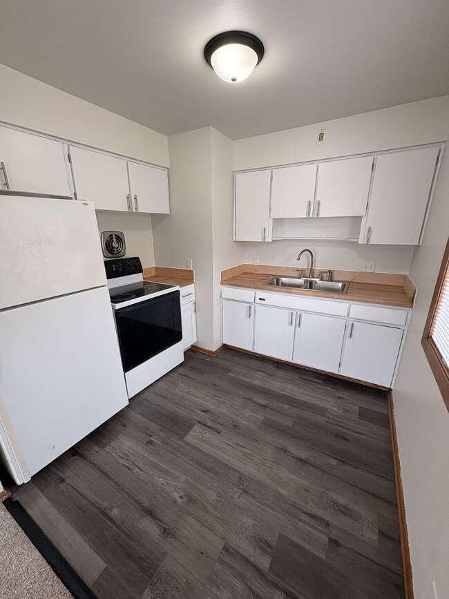 Building Photo - 8641 W Lapham St Unit 2