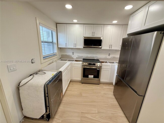 Photo - 8600 Sunrise Lakes Blvd Unit 102
