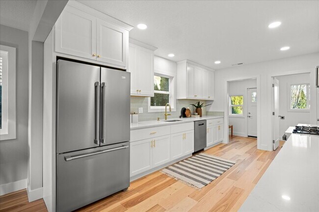 Photo - Beautifully Renovated 3-Bedroom Home with Private Fenced Yard Unit #A