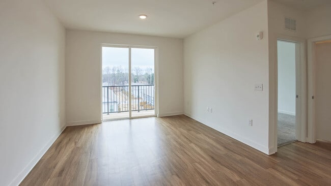Living Room with Balcony and Hard Surface Flooring