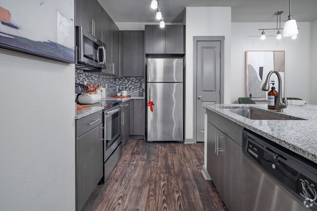 1 habitación, 1 baño, 792 pies cuadrados, cocina con encimera de granito - Axis Hamilton