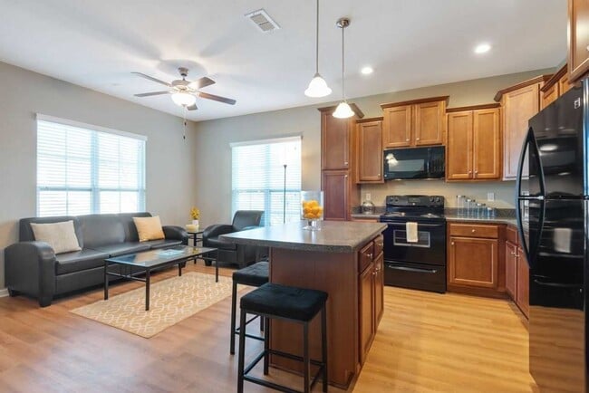 Photo - Modern 3-Bed, 3-Bath Townhome with Stylish Upgrades in Condo Community