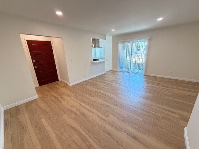 Photo - Completely Remodeled, Spacious 2 Bedroom Apartment For Rent w/ Parking! Unidad E