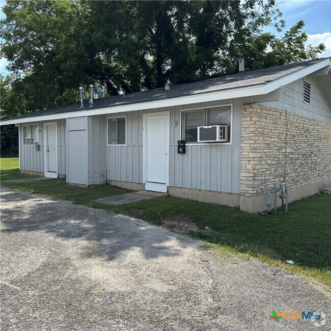 Building Photo - 1239 N LBJ Dr Unit E Rental