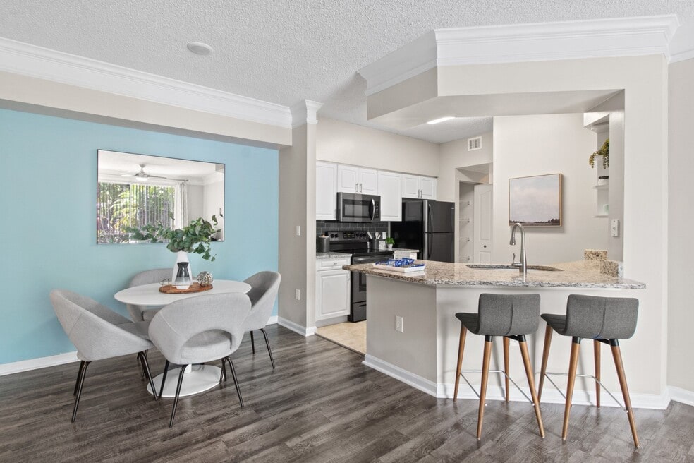 Kitchen and Dining Table at Verona at Boynton Beach Apartments in Boynton Beach, FL 33426