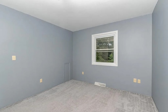 Photo - This charming house offers a cozy and comfortable living space.