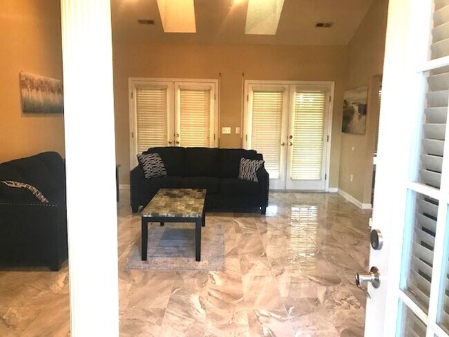 Photo - 4 Bedroom, 2.5 Bath, Pet Friendly Home with Fenced Yard & Sunroom! Available Soon!