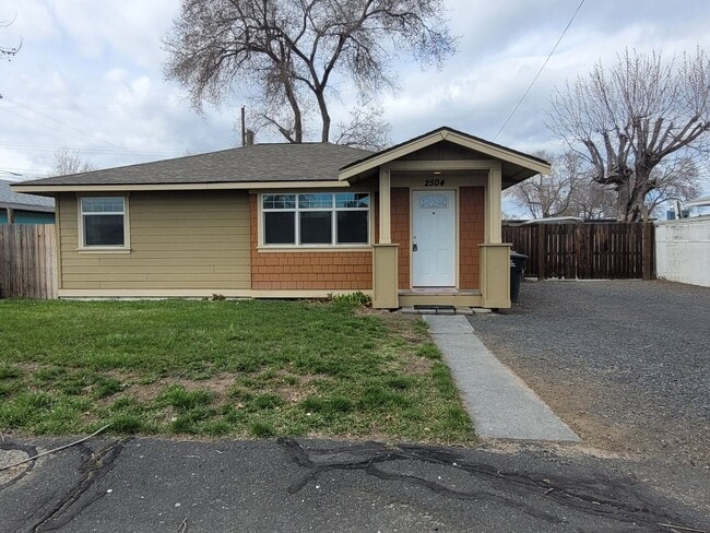 Building Photo - House with Fenced Backyard & May Rent Free