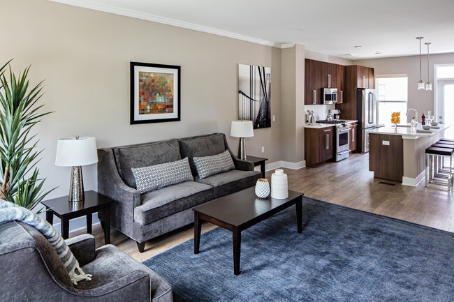 Townhome Signature Collection Living room with hard surface plank flooring throughout