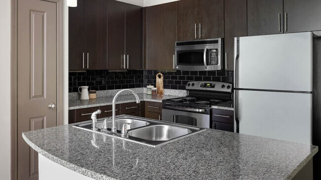 Kitchen with Stainless Steel Appliances - The Drexel Collective