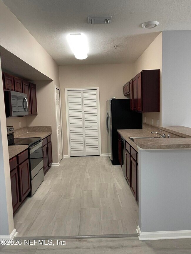 Photo - 6984 Ortega Woods Dr Unit 8-6