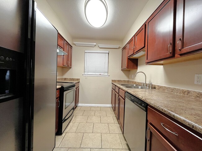 Photo - 1/2 Off First Months Rent! Absolutely darling, fully remodeled, single story, updated condo in a ...