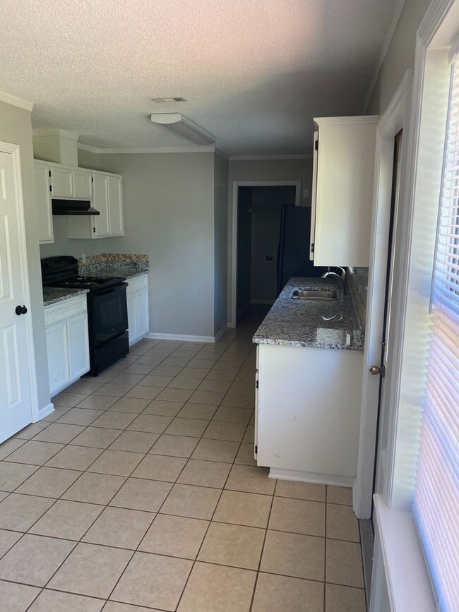 Photo - Spacious 3BR/2BA Home with Open Floor Plan, Granite Countertops & Fenced Backyard