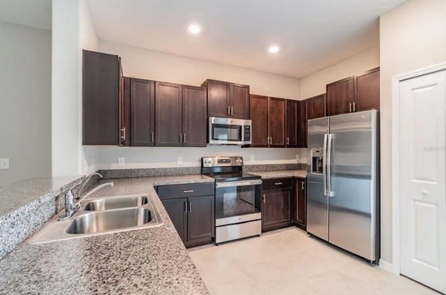Photo - Modern 3BR/2.5BA Townhome with Pool Access & Deposit-Free Living!