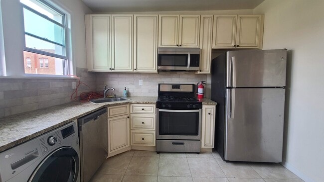 Building Photo - 210 73rd St Unit 2 Rental