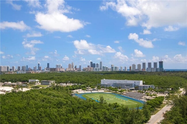 Building Photo - 14951 Royal Oaks Ln Unit 1109