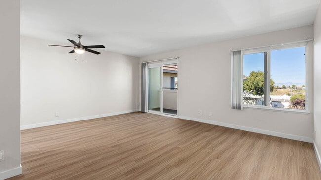 Living Room with Balcony and Hard Surface Flooring