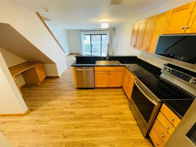 Photo - Top Floor 1bdrm Condo with River Views and Private Deck | Most Utilities & Parking Included! Unidad D5