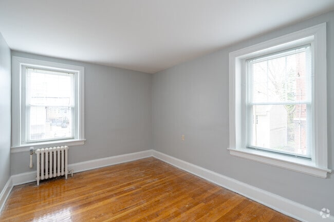 2BR, 1BA - 1180SF - Primary Bedroom - Windsor Apartments