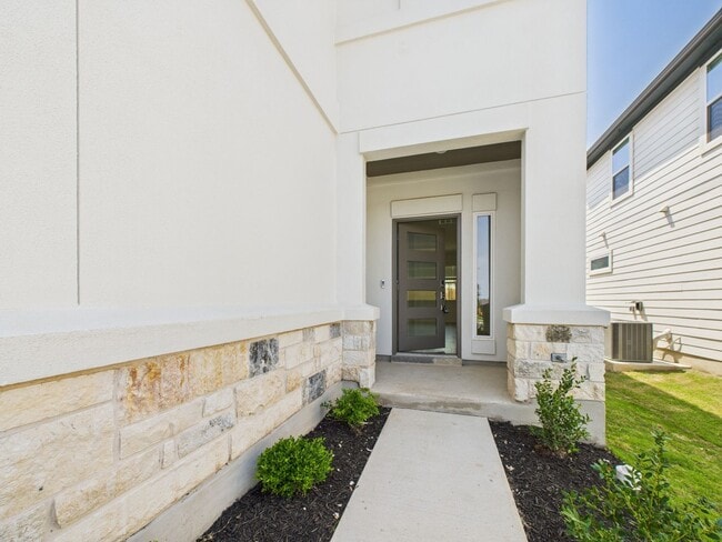 Photo - New stone Wall Ranch home
