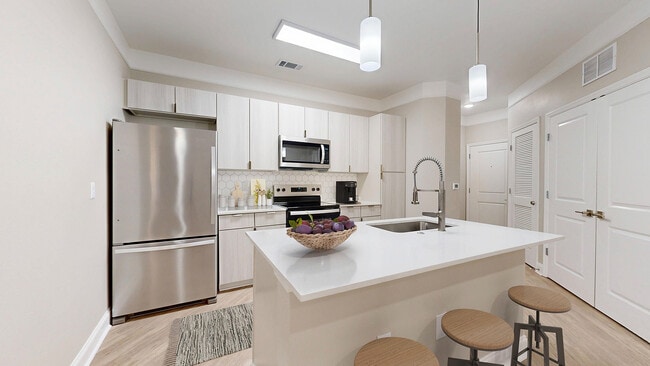 Newly Renovated Kitchen with Breakfast Bar - The Retreat at Quail North Apartments