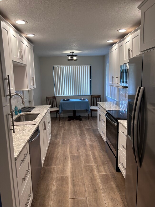 Building Photo - 8559 Pomelo Tree Ln