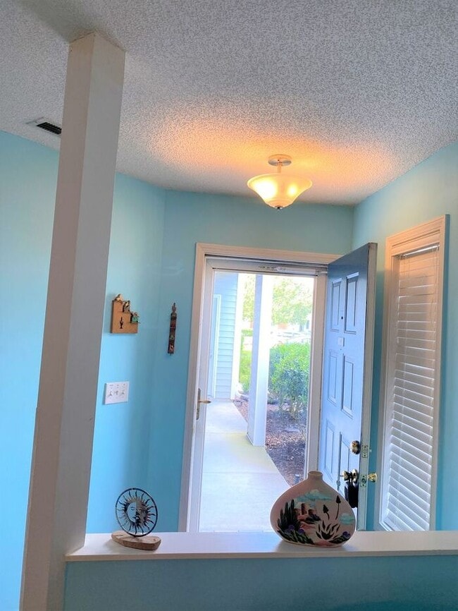 Photo - Furnished! Breezewood ground floor unit, Open floor plan, fire place, patio, large closets, wood ... Unit Apt 101