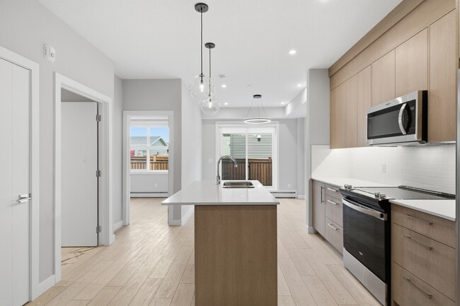 Photo - 265-1265 Wolf Willow Blvd SE