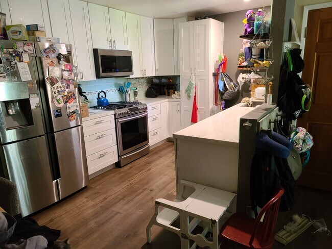 Kitchen, fridge to pantry/broom storage - 3400 Santa Maria Way Unit 203