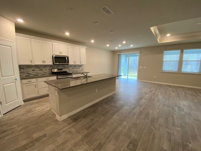 Photo - Freshly Updated 5-Bedroom, 4-Bath Home in Grand Oaks – Nearly New Condition