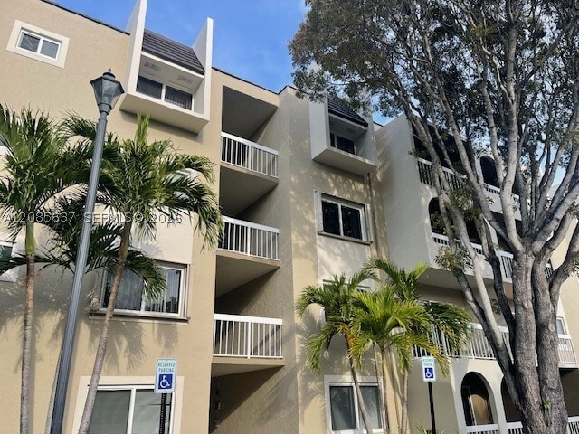 Building Photo - 7703 Camino Real Unit A-213