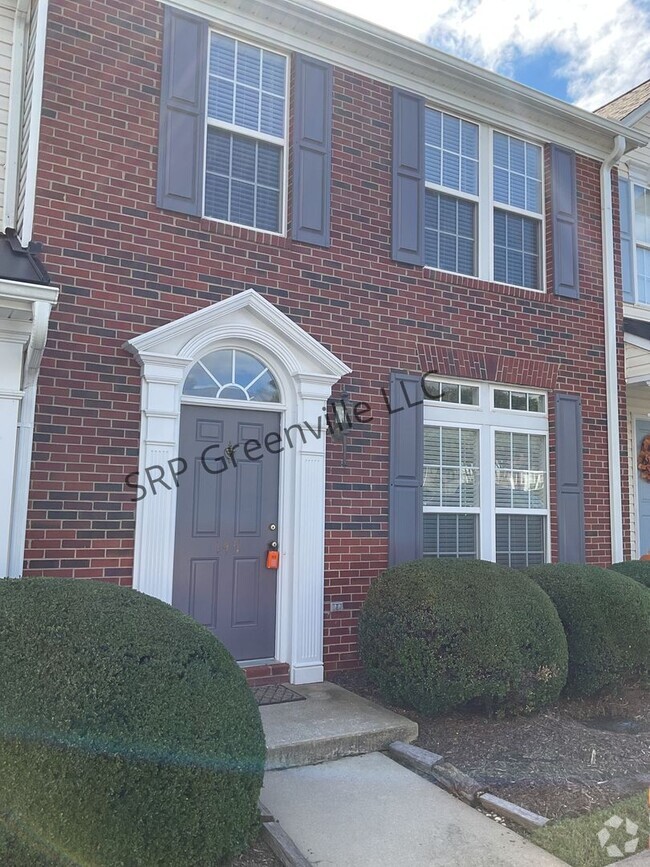 Building Photo - This beautiful brick, move-in-ready townho... Rental