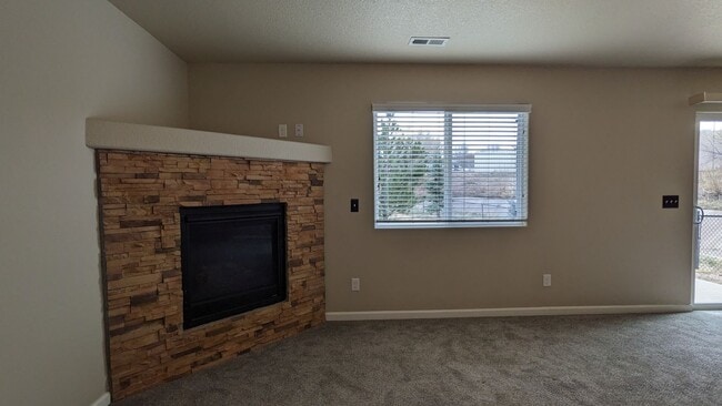 Photo - 3 BED/2.5 BATH END UNIT TOWNHOME W/PATIO & 2-CAR GARAGE!