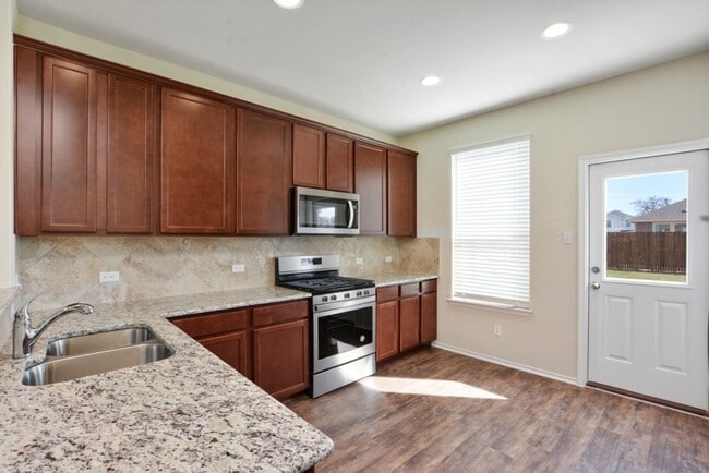 Photo - Inviting 4BD/3BA Rental Home with Walk-In Closet & Big Yard