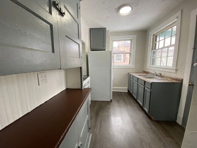 Photo - Cozy Akron Home w/ Fireplace Charm, Detached Garage & Back Porch