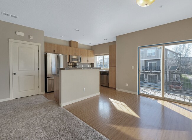 Photo - 2BR + 2.1BA Corner Townhome-Style Condo — Dual Primary Suites, Attached Garage & Most Utilities I...