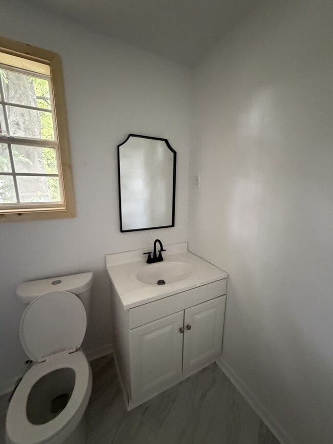 Photo - Spacious 3-Bedroom, 2-Bath House – Unfurnished