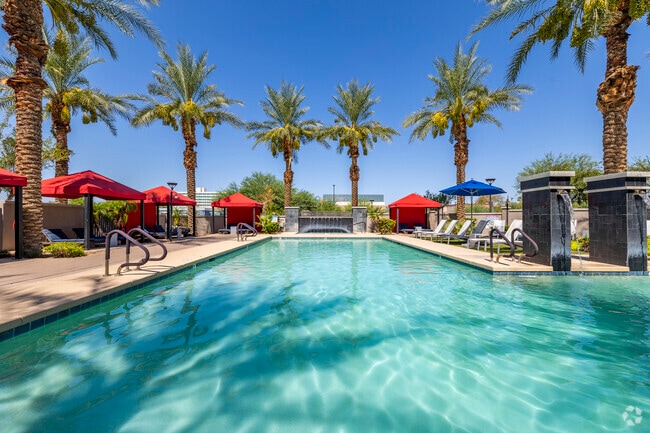 Heated Resort-Style Pool with Cabanas and Water Features